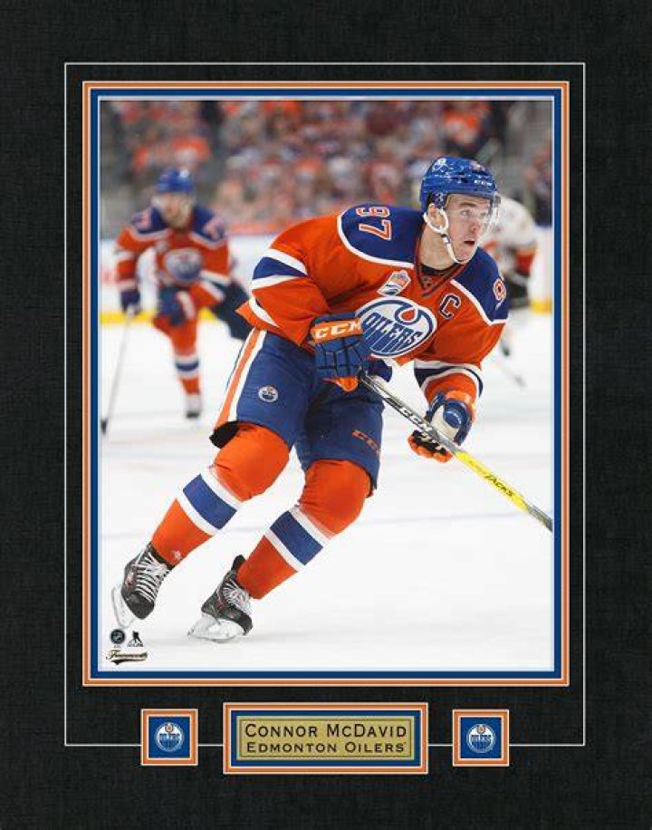 How old was Connor McDavid when he was drafted? How many hat tricks does Connor McDavid have?