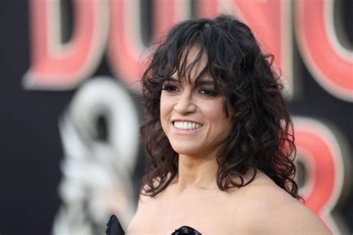 Is Gina Rodriguez related to Michelle Rodriguez?