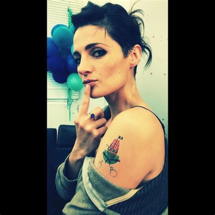 Katherine Moennig: Single, net worth, tattoos, smoking & body measurements